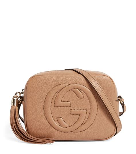 gucci camera bag with tassle.